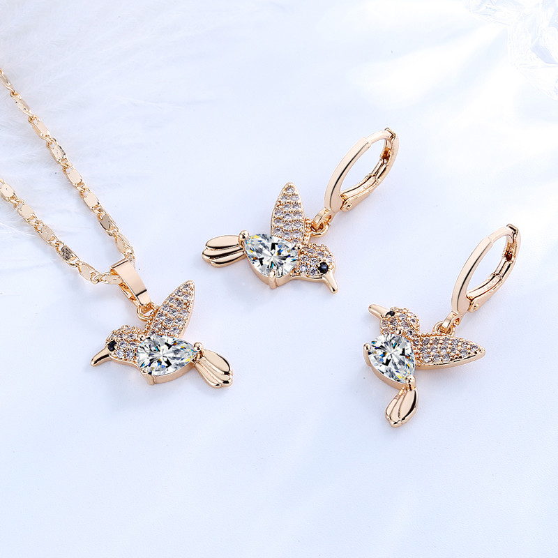 white humming bird jewelry sets