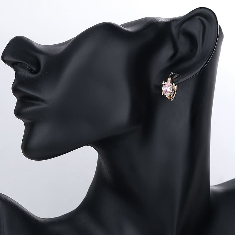 pink turtle huggie earring wearing