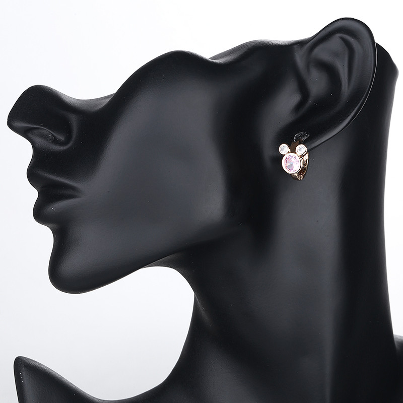 pink turtle huggie earring wearing