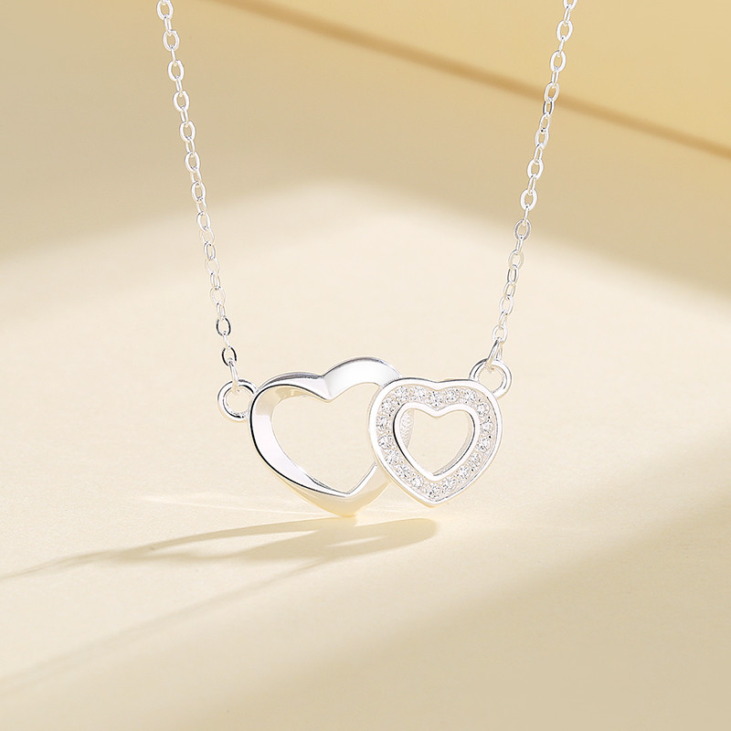 Discover the Timeless Symbolism of the Double Heart Zircon Silver Necklace