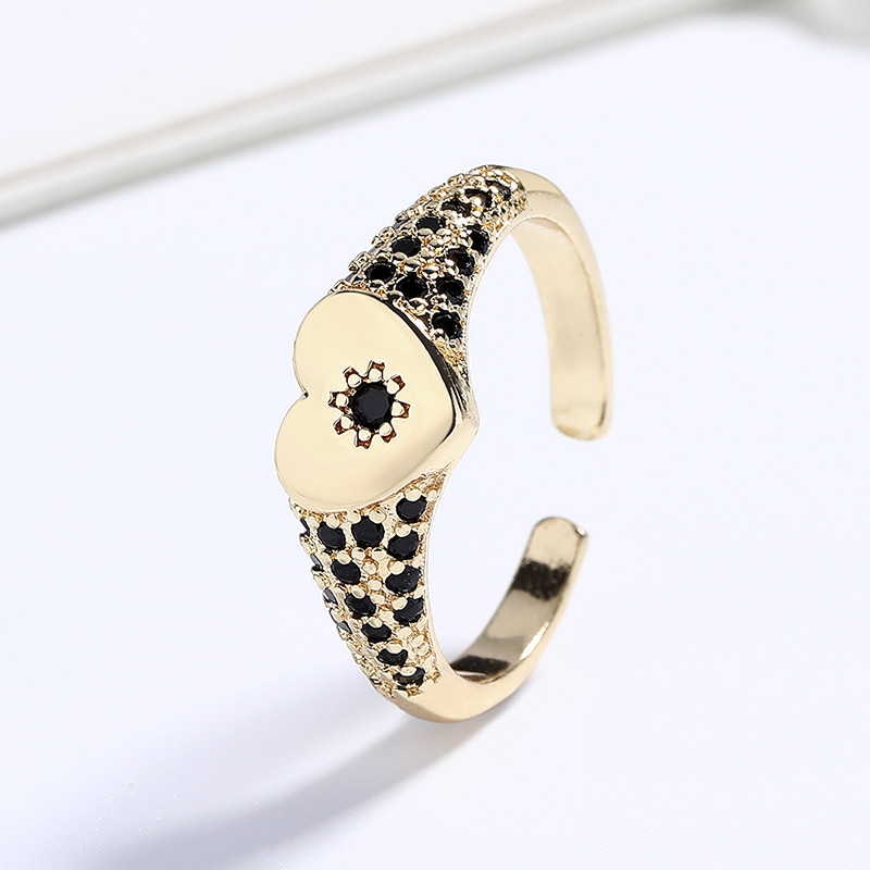 anillos chapados en oro con circonitas y flores en forma de corazón