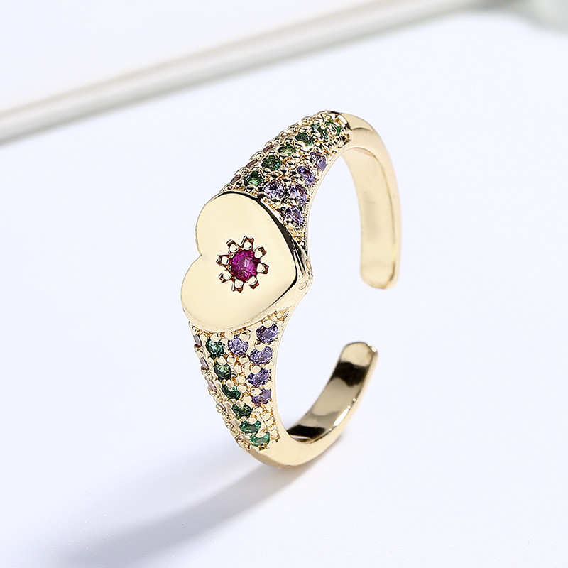 anillos chapados en oro con circonitas y flores en forma de corazón