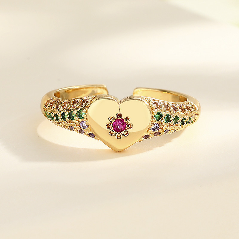 anillos chapados en oro con circonitas y flores en forma de corazón