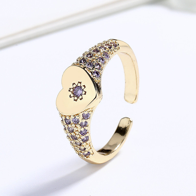 anillos chapados en oro con circonitas y flores en forma de corazón