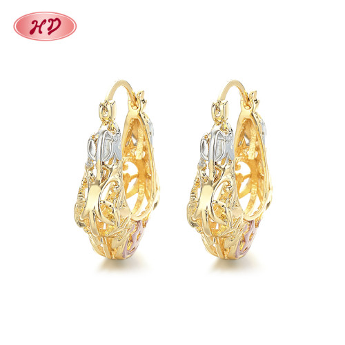 Hengdian personaliza joyas de estilo retro al por mayor de oro laminado de mujeres Aro de pendientes