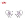 Venta al por mayor de pendientes de botón para mujer de plata de ley 925 con diseño de corazón y flor ahuecados en blanco y circonita