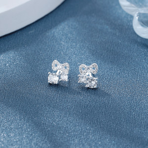 Venta al por mayor de pendientes de plata de ley 925 para mujer con bonito lazo y circonita cúbica