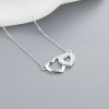 Collares colgantes de doble corazón de plata de ley S925 con circonita AAA al por mayor