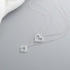 Collar al por mayor de China | Cadena de doble capa con corazón hueco y flor, joyería de plata 925