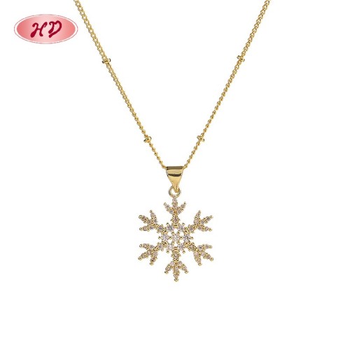 Bisutería Collar con colgante de copo de nieve chapado en oro de 18 quilates | elegancia invernal