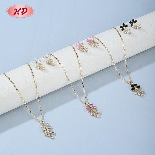 Conjunto de pendientes y collar de flores de oro de 18 quilates con circonita negra para uso en la oficina