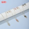 Conjunto de pendientes y collar de flores de oro de 18 quilates con circonita negra para uso en la oficina