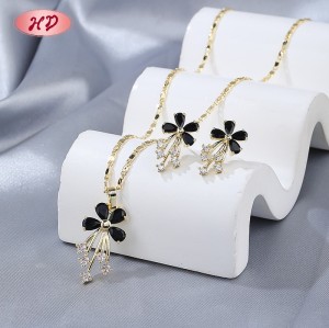 Conjunto de pendientes y collar de flores de oro de 18 quilates con circonita negra para uso en la oficina