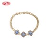Elegant Blue CZ Floral Link Bracelet | 18K Gold Plated Wholesale Jewelry