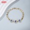 Elegant Blue CZ Floral Link Bracelet | 18K Gold Plated Wholesale Jewelry