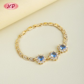 Elegant Blue CZ Floral Link Bracelet | 18K Gold Plated Wholesale Jewelry