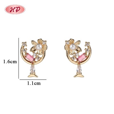 Wholesale 18K Gold Plated Floral Crescent Moon Huggie Earrings with Pink Baguette CZ | Factory Direct Manufacturer