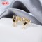 Wholesale 18K Gold Plated Flower Moon Huggie Hoop Earrings with Black CZ Stone Accents | Hengdian Jewelry
