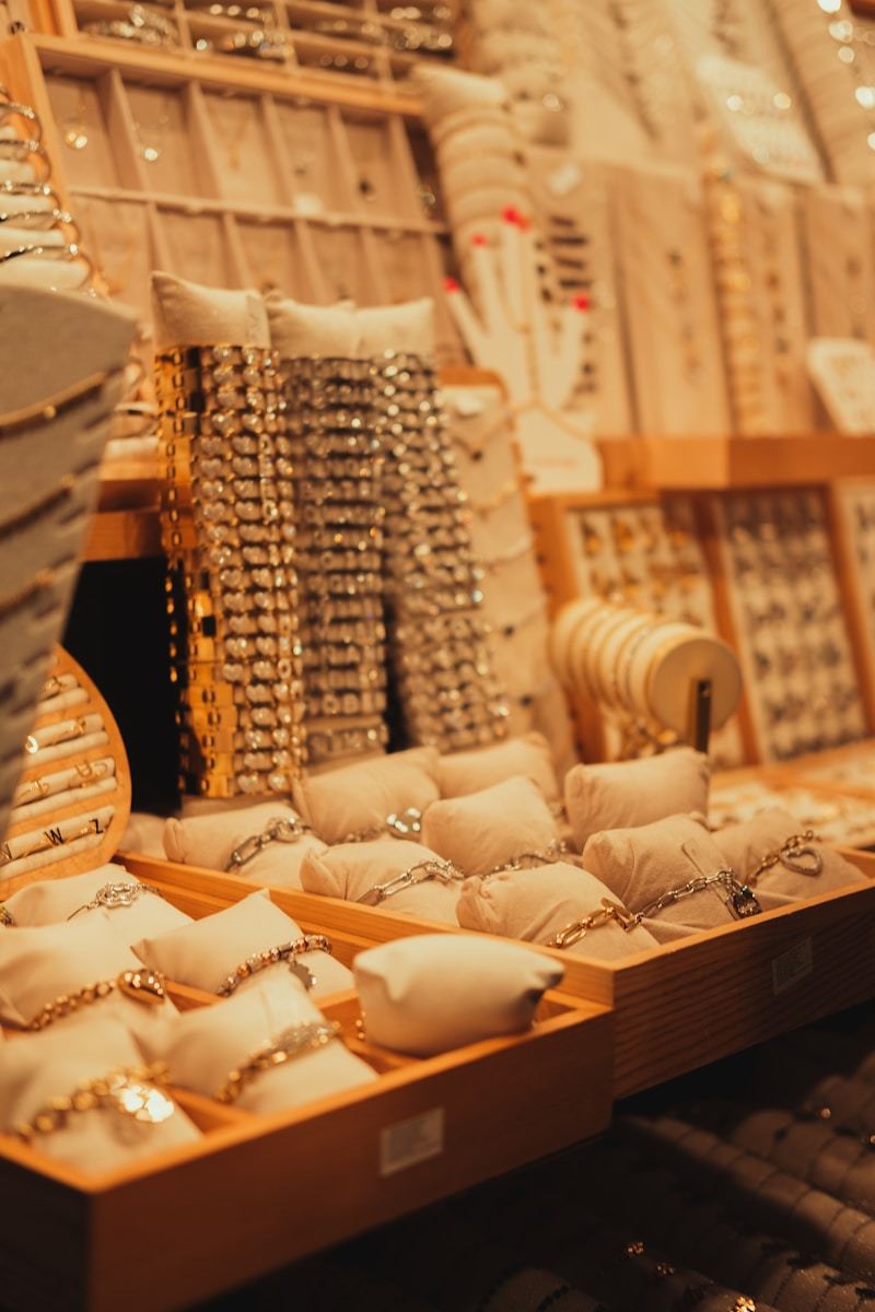 Display case filled with gold-toned jewelry collection