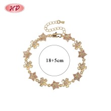 Brazalete Flor y Estrella CZ Champagne | Eslabón Bañado Oro 18K Mayorista