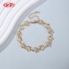 Brazalete Flor y Estrella CZ Champagne | Eslabón Bañado Oro 18K Mayorista