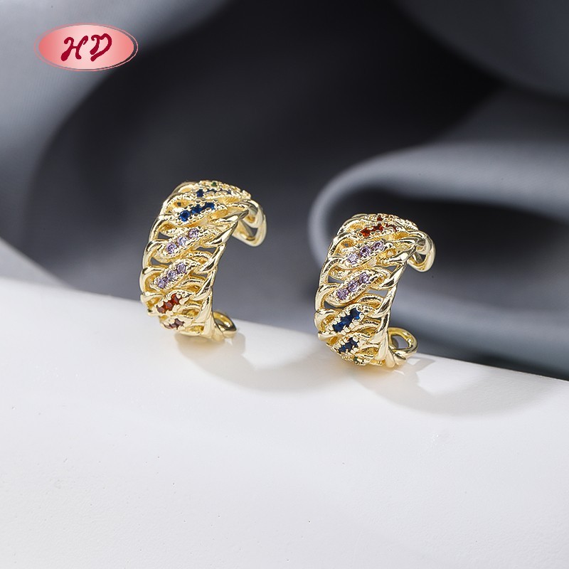 18K gold plated clip on earrings styled on silk platform for retail display