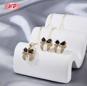 Juego de Joyería Clásico con Lazo y CZ Multicolor | Latón Chapado en Oro 18K al por Mayor