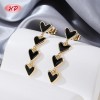 Aretes corazón 4 niveles esmalte negro chapado en oro 18k | Fabricante directo