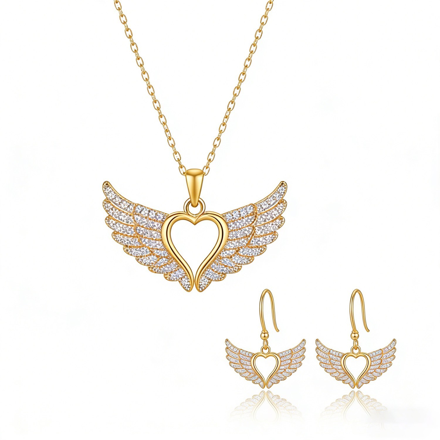 Winged heart pendant and earrings on clean background