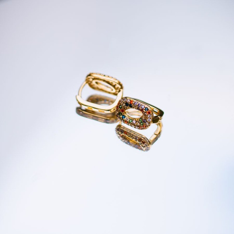 Close-up of 18K gold plated rings set with colorful AAA cubic zirconia