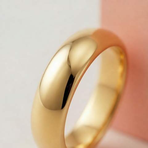 Macro view of a smooth lustrous gold plated ring surface
