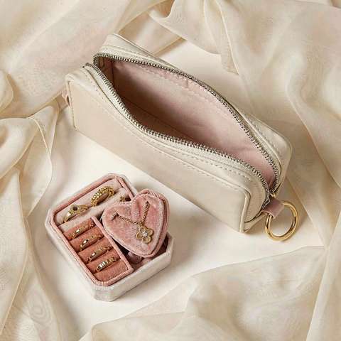 Gold-plated jewelry kept in a storage pouch and box