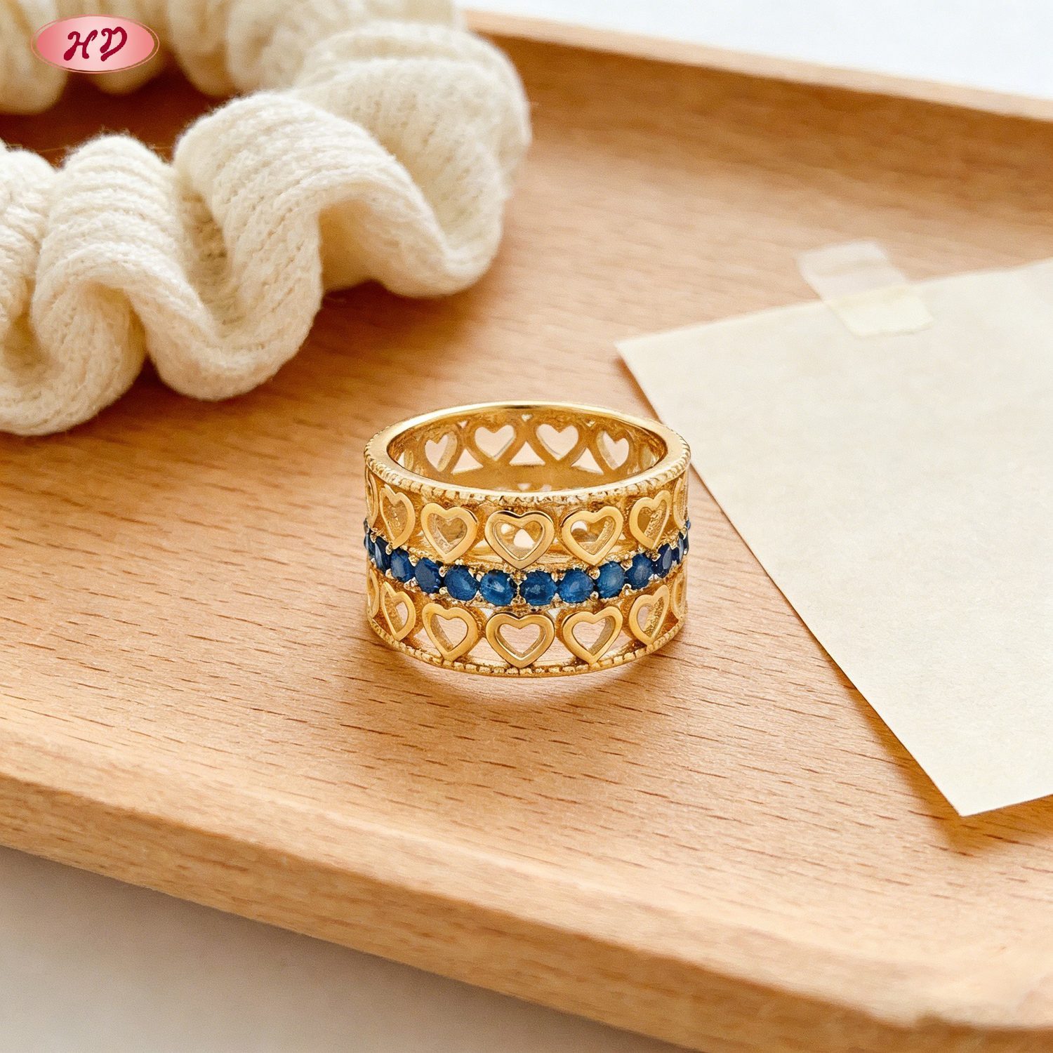 Refined 18K gold plated cubic zirconia ring angled view