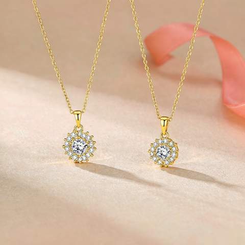 Two gold plated pendant necklaces displayed side by side for comparison