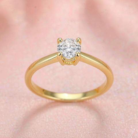 Prong-set cubic zirconia stone held in a gold plated ring