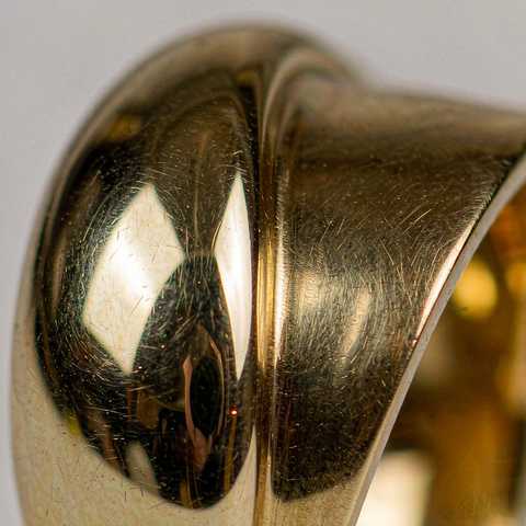 Macro view of a gold plated ring surface