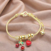 Pulsera china al por mayor con diseño de cereza y corazón, chapada en oro de 18 quilates, para mujer.