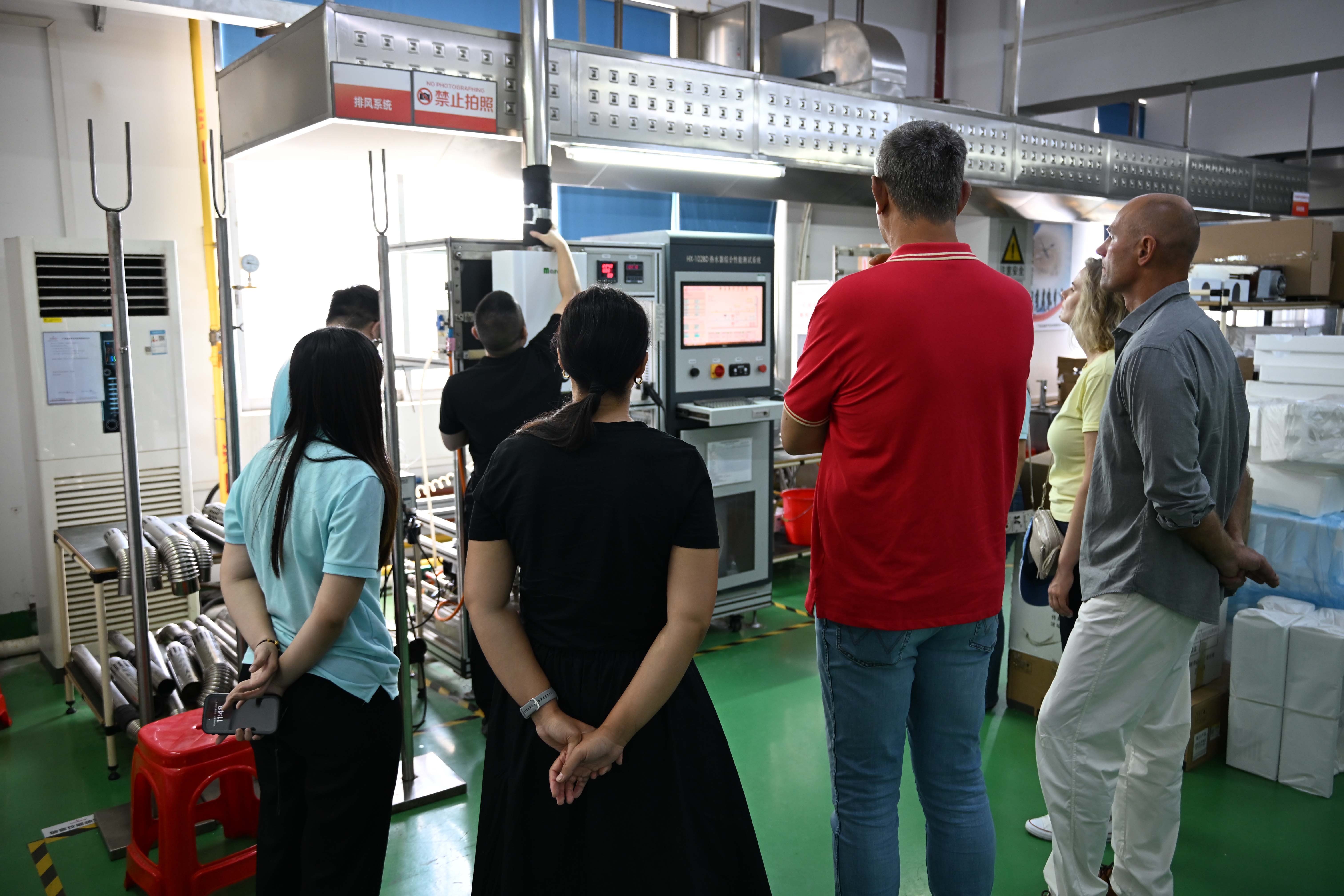 Customers attend Greaidea's gas water heater laboratory
