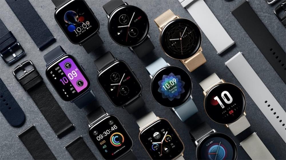 a variety of smartwatches with dials and straps