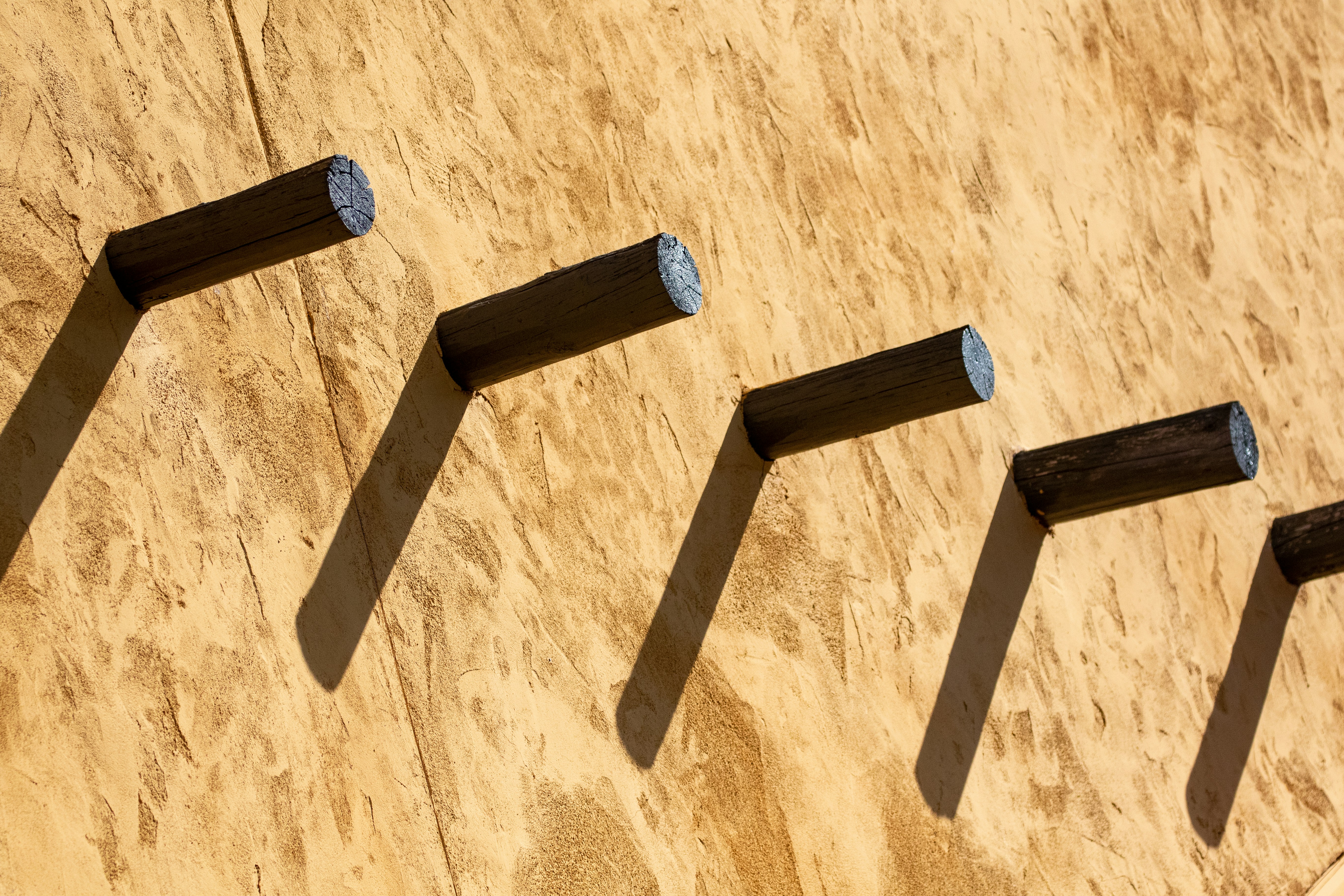A collection of different metal table leg styles, including hairpin, X-frame, U-shape, and pedestal legs, displayed against a neutral background.