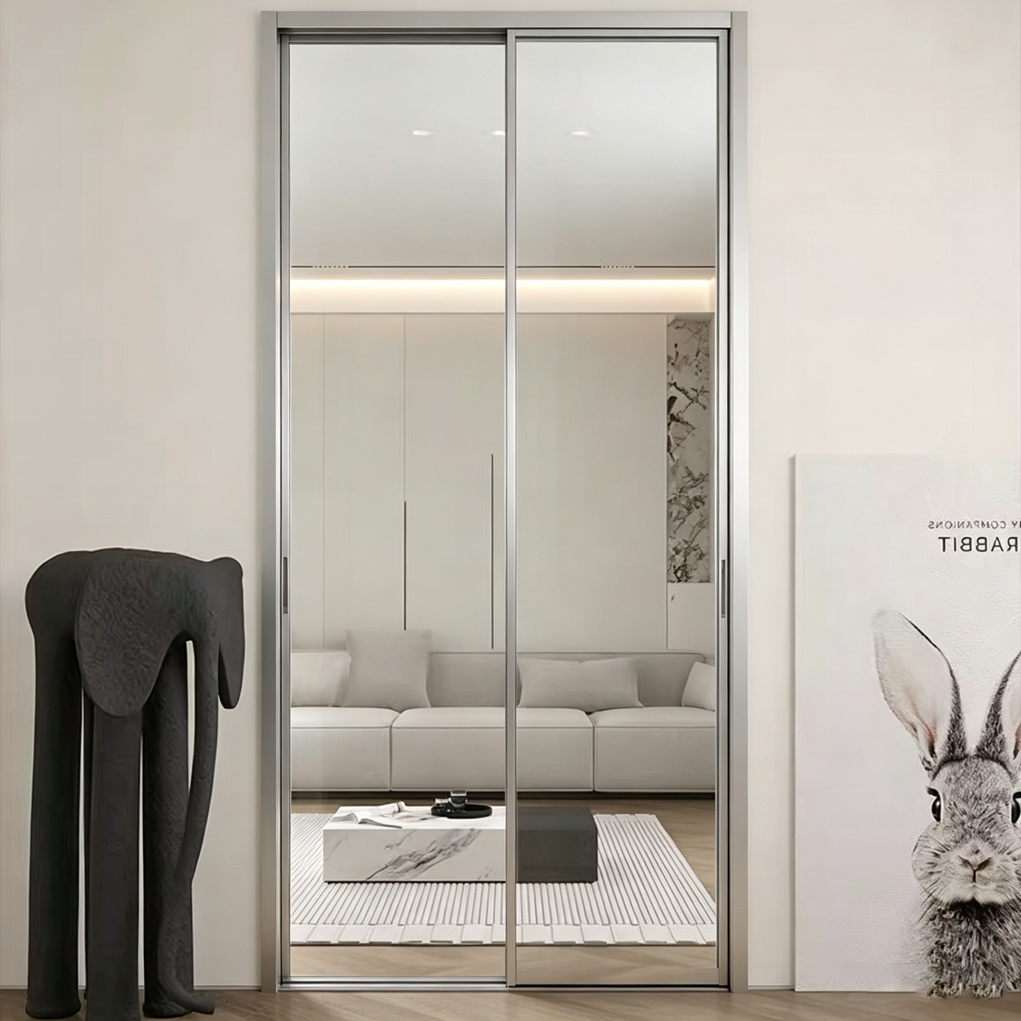 Silver framed mirrored sliding door reflecting a bright living area