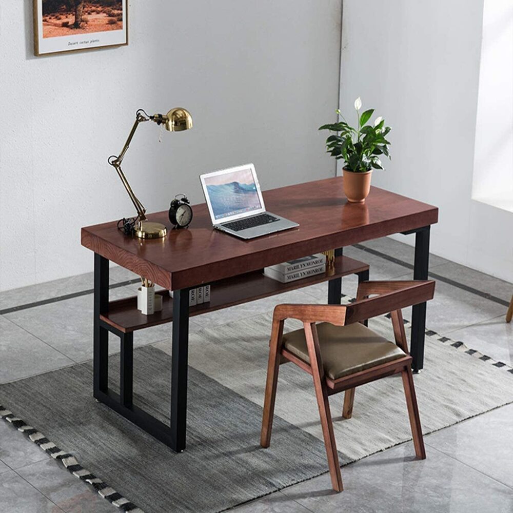 Wooden desk with black rectangular metal table legs in a study
