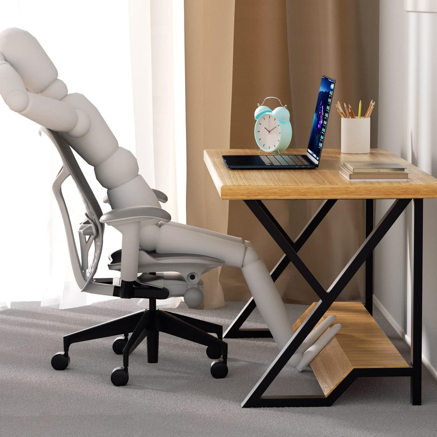 Desk with crossed black metal legs beside an office chair