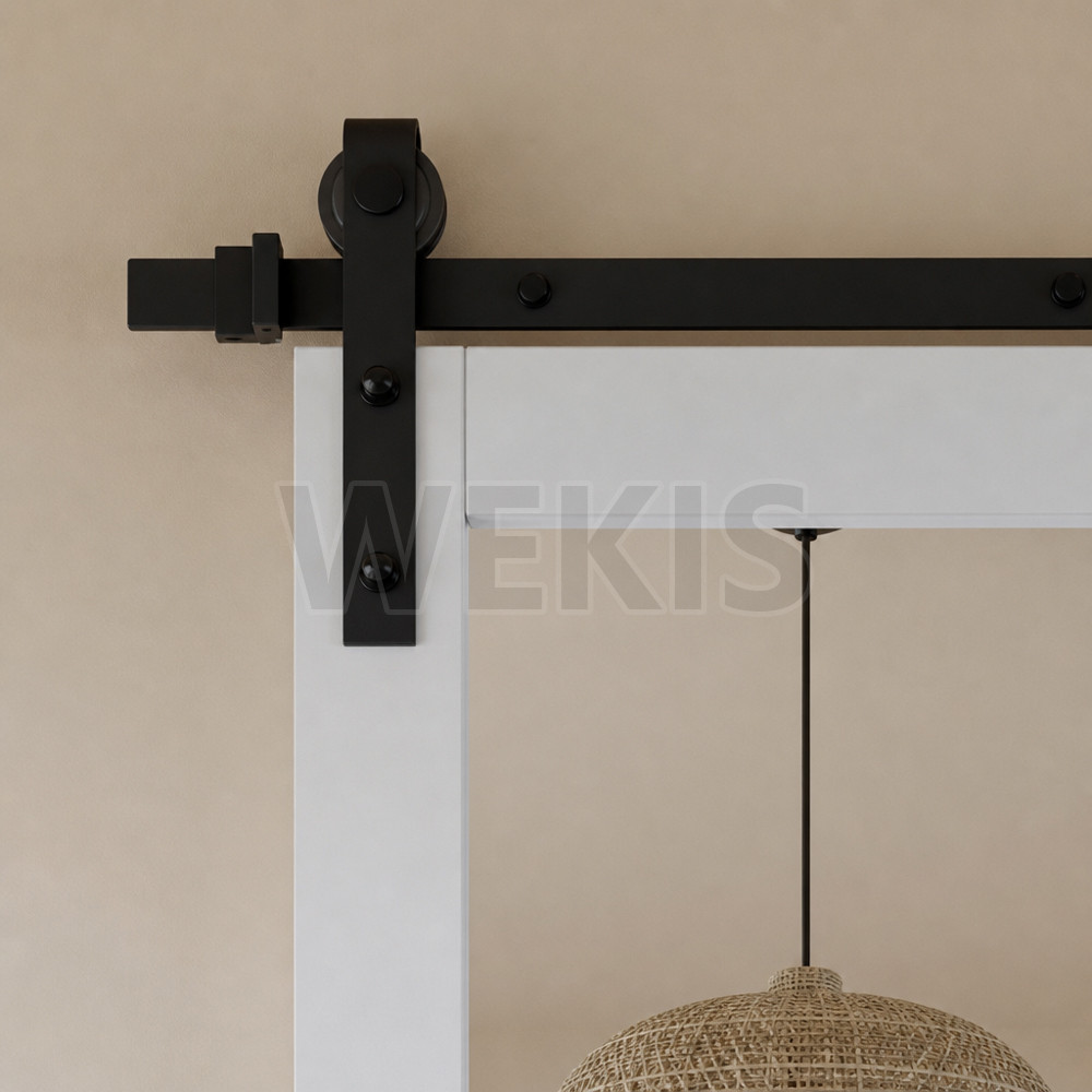 Black sliding track with end stopper above the mirrored panel