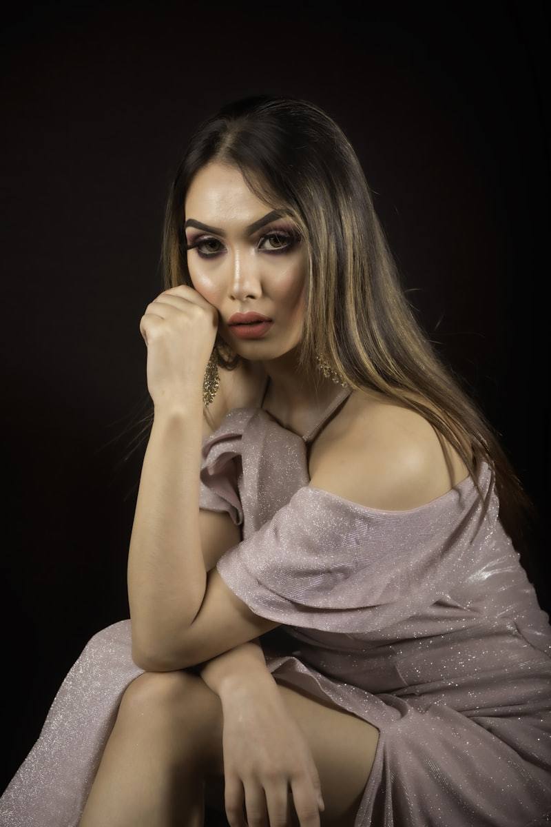 Fashion model with lavender dress and beauty makeup
