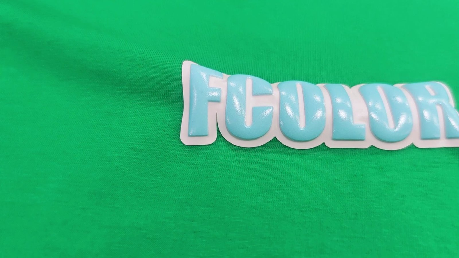 UV Thick Label Transfer on Garments: How FCOLOR Builds 3D Raised Brand Logos for Apparel