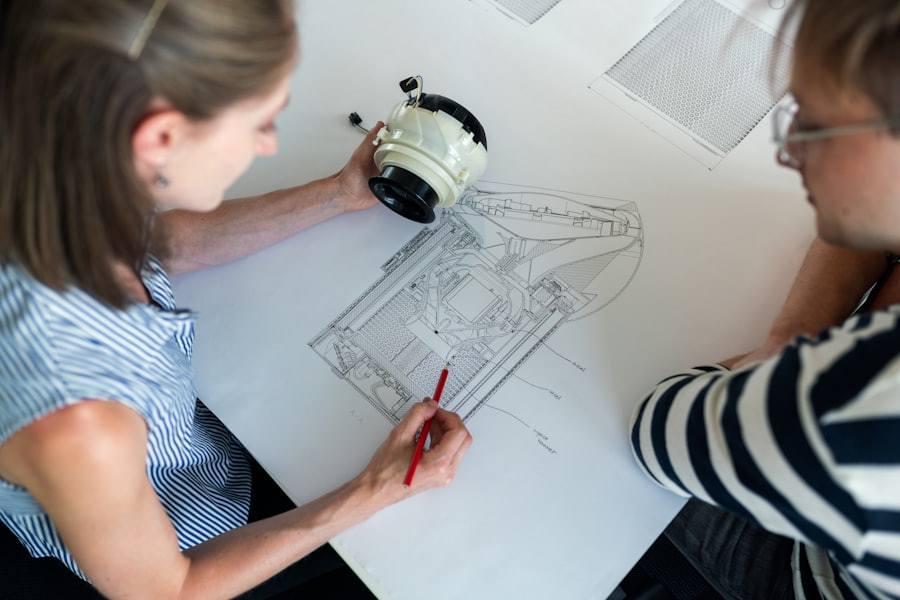 Process engineers reviewing a technical drawing