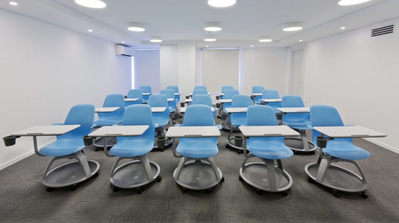 training room chair with writing pad