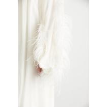 Long sleeve dress with beige pearl collar and ostrich feather