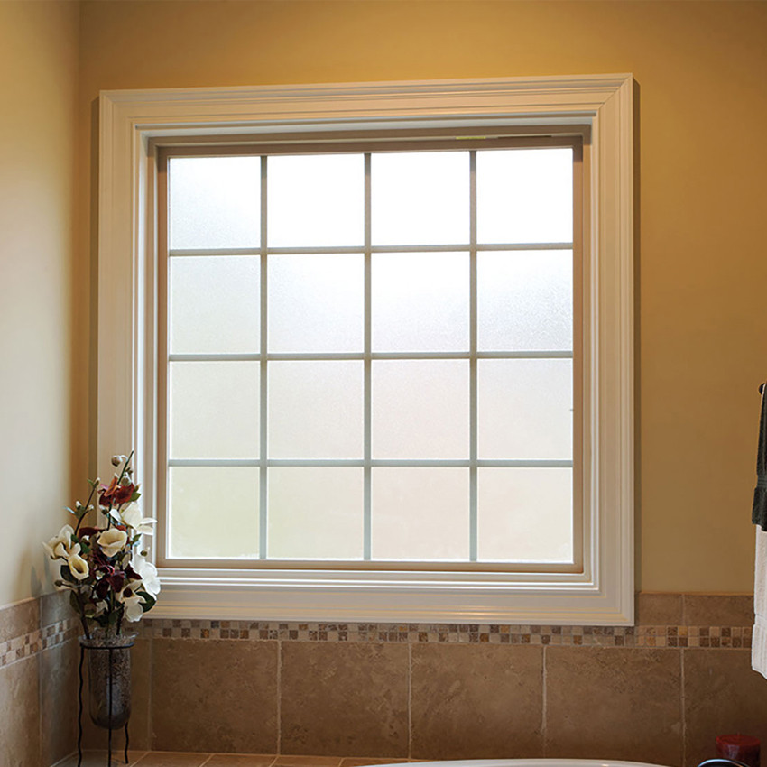 White uPVC fixed window with decorative grid and privacy glass